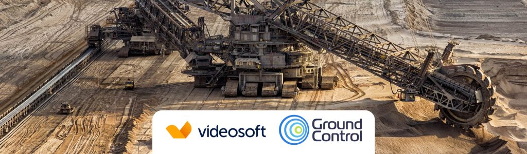 Mining excavator machinery in a remote location, monitored by real-time secure video surveillance