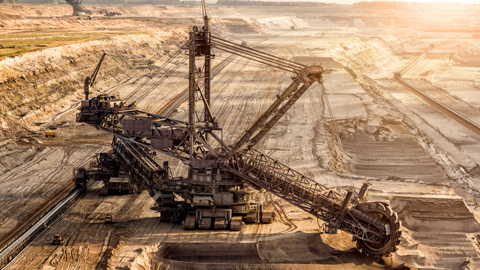 Giant bucket wheel excavator operating in an open pit mine