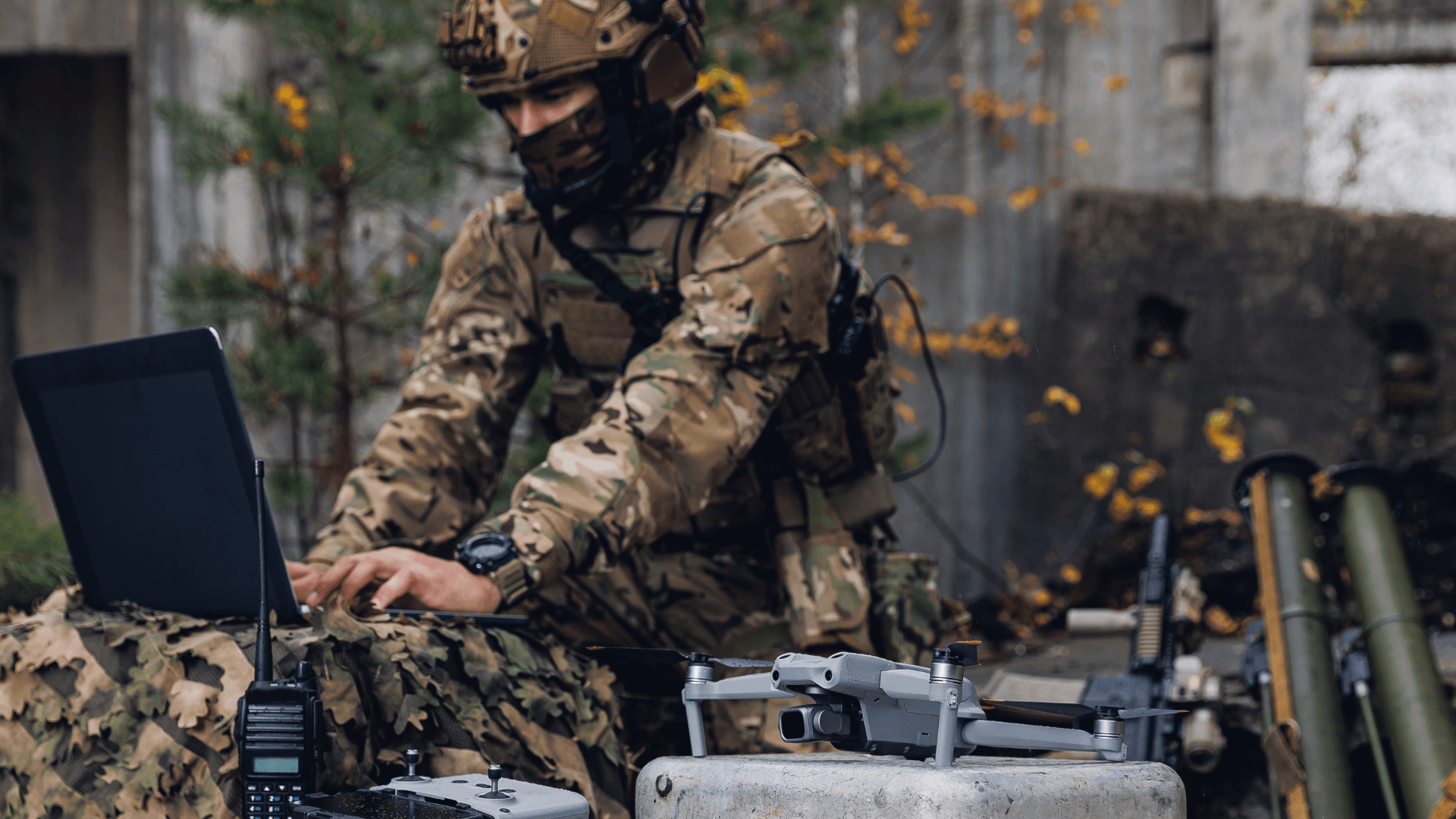 A solider controlling an unmanned aerial vehicle remotely